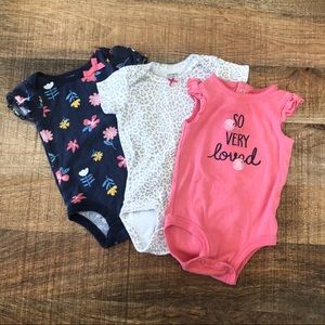 Set of adorable Carter’s onesies